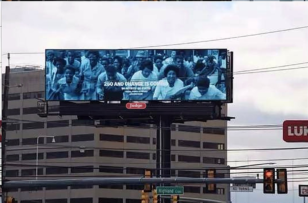 Carrie Mae Weems 250 and Change Is Coming on a digital bulletin over Route 17 in Rutherford, New Jersey