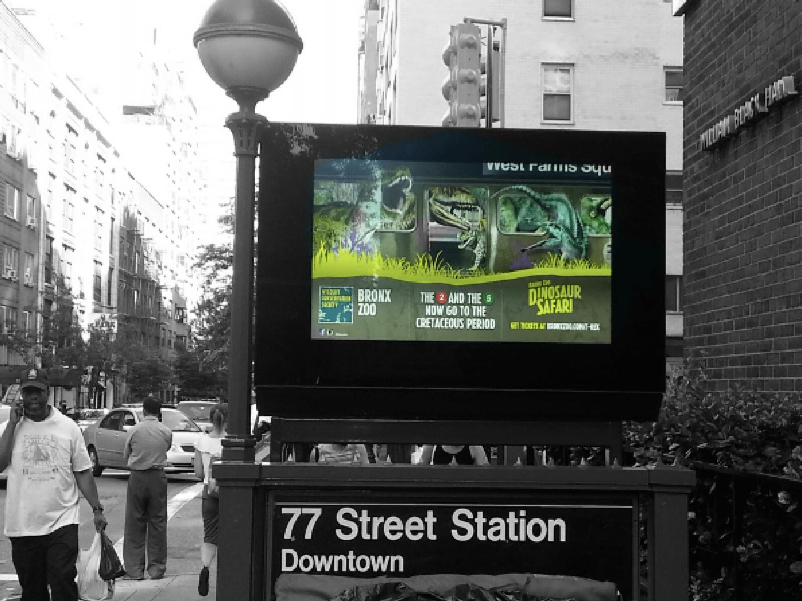 Bronx Zoo Dinosaur Safari digital urban panel above the 77 Street subway station entrance